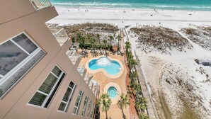 A resort with a pool area, beach access, and a view of the ocean. - Destin Towers 143 (Destin)