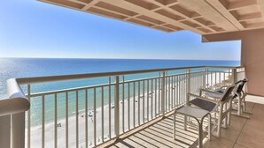 A balcony with a view of the beach and ocean. - Destin Towers 143 (Destin)
