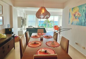 Dining - Immerse yourself in the coastal serenity of our oceanfront apartment. (Juan Dolio)
