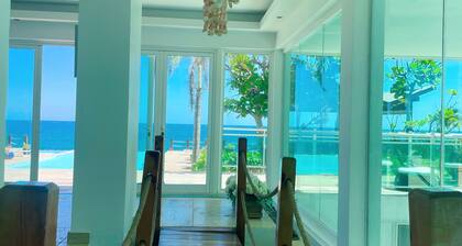 Immerse yourself in the coastal serenity of our oceanfront apartment.