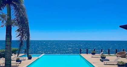 Immerse yourself in the coastal serenity of our oceanfront apartment.