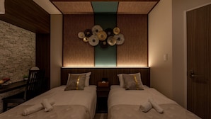 A hotel room with two beds, a stone wall, a wooden ceiling, and a decorative wall panel.