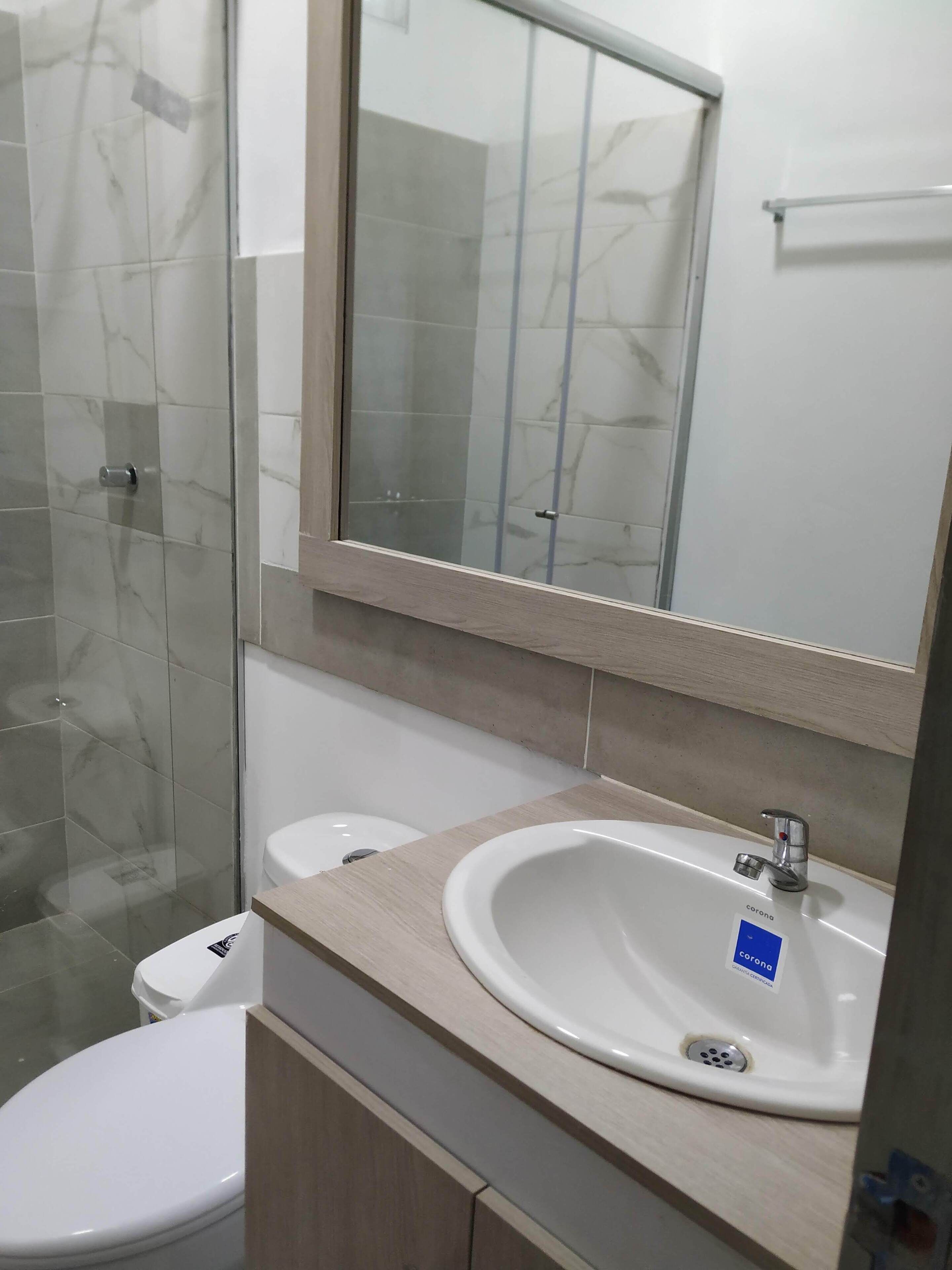 Shower, towels, soap, toilet paper