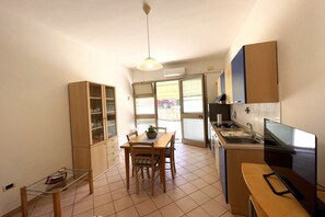 Fridge, stovetop, coffee/tea maker, cookware/dishes/utensils