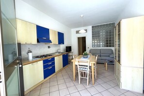 Fridge, stovetop, coffee/tea maker, cookware/dishes/utensils