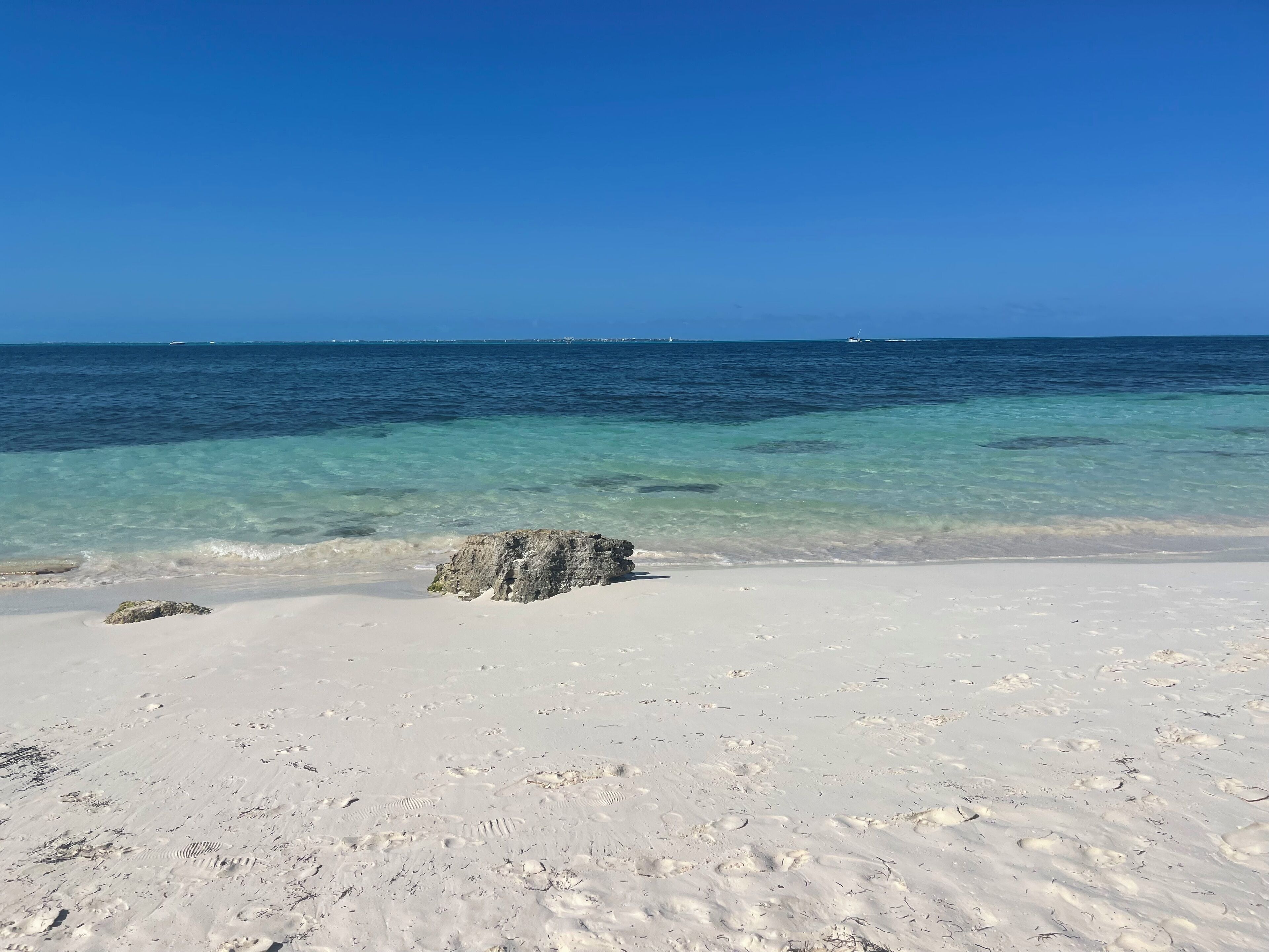 On the beach, white sand, free beach cabanas, sun loungers