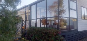 Outdoor dining - Warrington, Blueskin Bay, close to Dunedin, cosy home close to the beach and bay (Warrington)