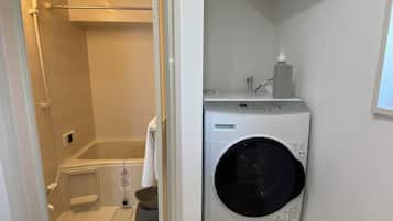 Deep soaking tub, hydromassage showerhead, hair dryer, bathrobes