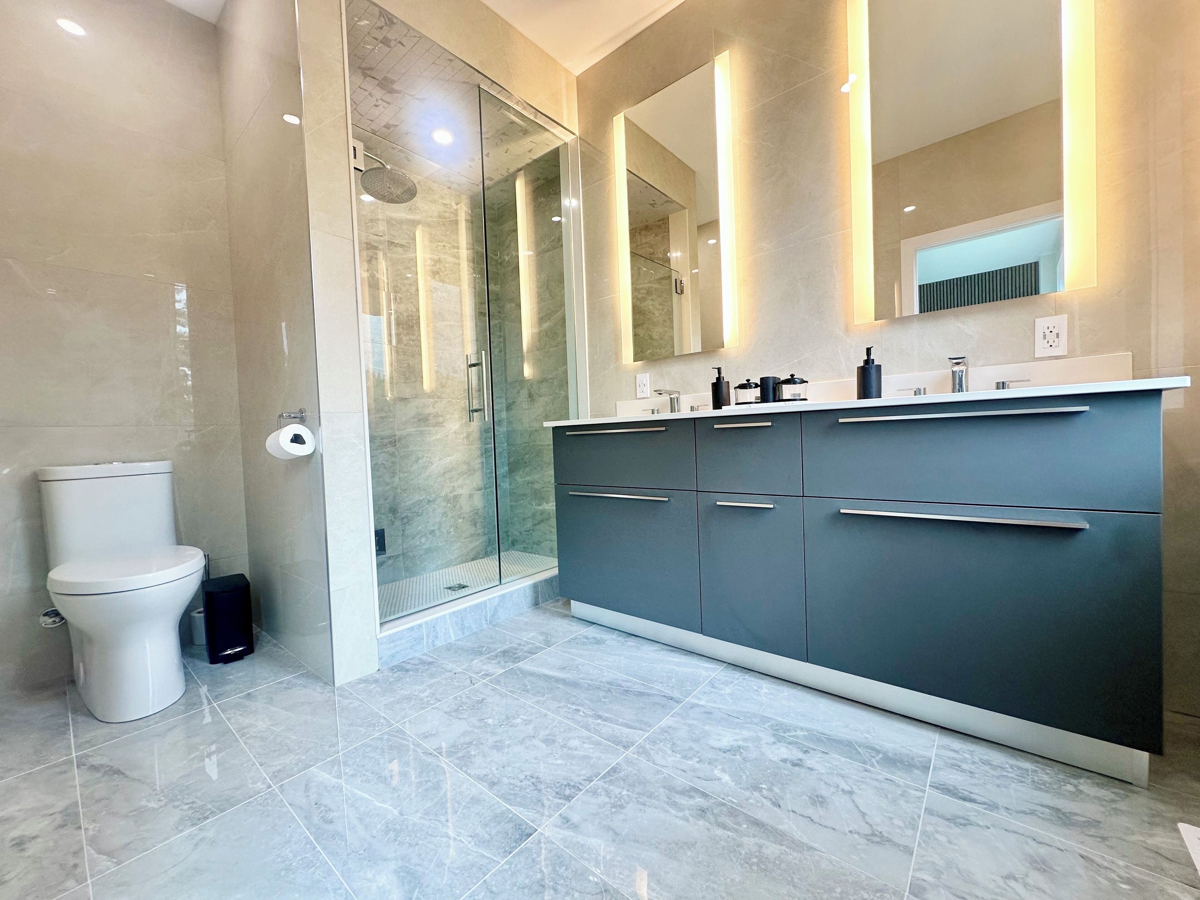 Shower, towels, soap, toilet paper