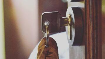 A key in a lock, suggesting a secure entry point.