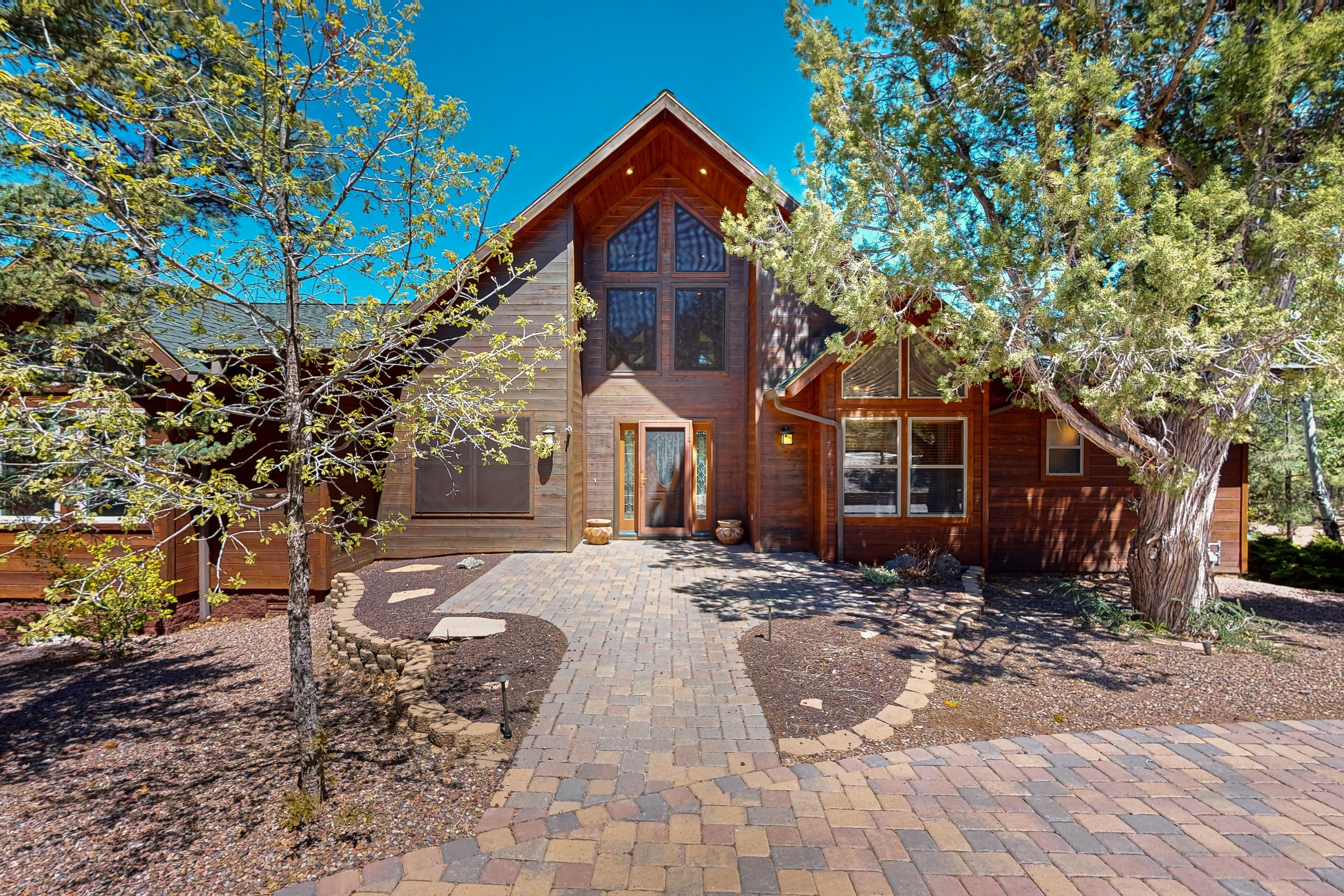 Two-story home on the fairway with hot tub, fire pit