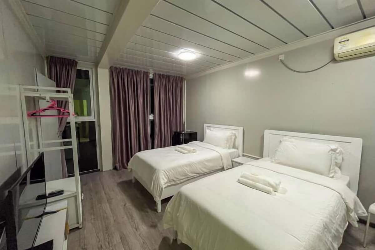 1 habitación y ropa de cama