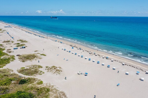 On the beach, beach towels, kayaking, motor boating