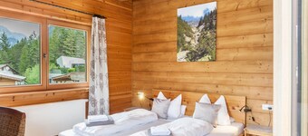 'Blockhaus Sonnenspitz' piso de vacaciones con vistas a la montaña, jardín comunitario y WLAN