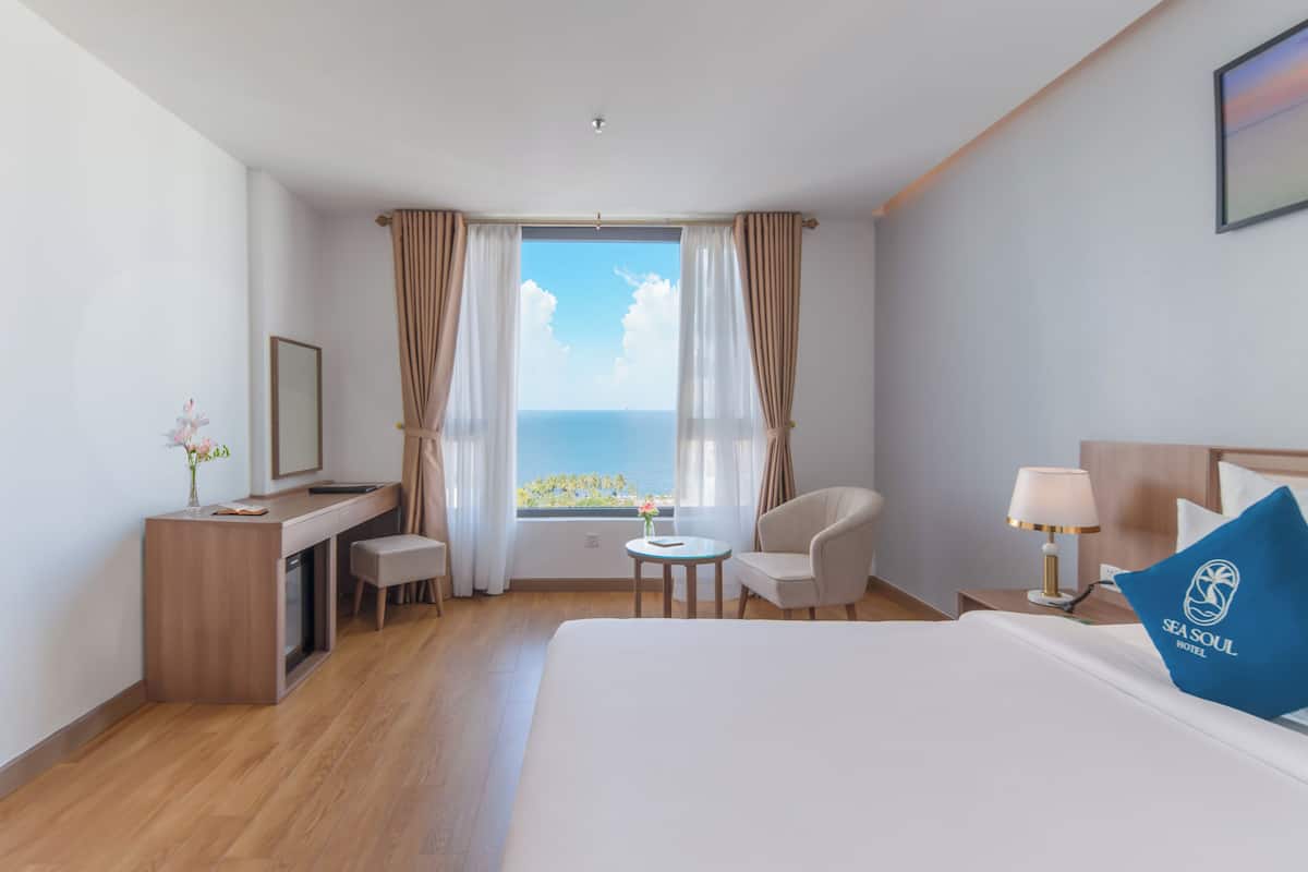 Premier Double Room, Sea View | Minibar, in-room safe, desk, blackout drapes