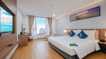 Premier Double Room, Sea View | Minibar, in-room safe, desk, blackout curtains