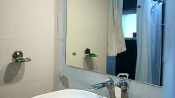 Shower, rainfall showerhead, towels, soap