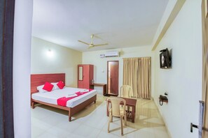 Quarto casal luxo | Área de estar | TV