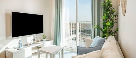 Standard Room, Non Smoking, Bathtub | Living area | 55-inch Smart TV with digital channels
