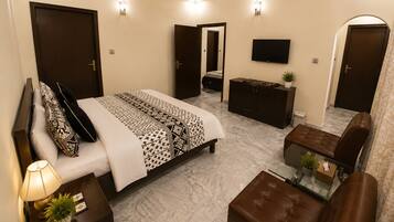 Suíte executiva | Wi-Fi de cortesia, roupa de cama