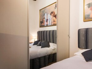 1 bedroom, desk, iron/ironing board, travel cot