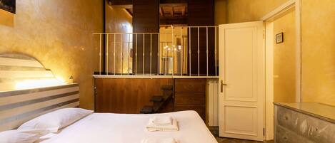 2 habitaciones, tabla de planchar con plancha y cuna de viaje