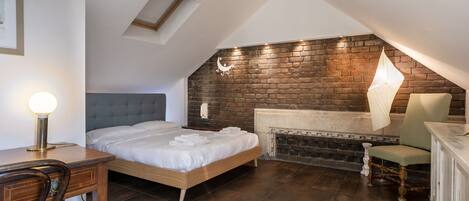 1 bedroom, desk, iron/ironing board, travel crib