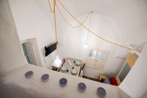 Enjoy a meal for two in this stylish room with a dining area and a cozy ambiance.
