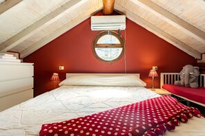 2 slaapkamers, een strijkplank/strijkijzer, reisbedje, gratis wifi