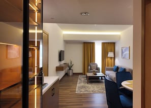 Suite, 1 King Bed | Living area | 42-inch LCD TV with cable channels, streaming services - Golden Tulip Muscat (Muscat)