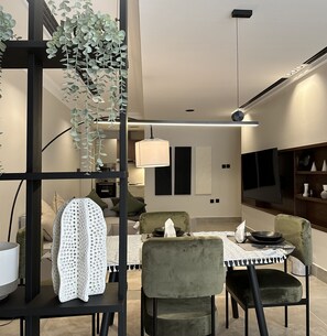 Apartamento | Área de estar | TV de tela plana