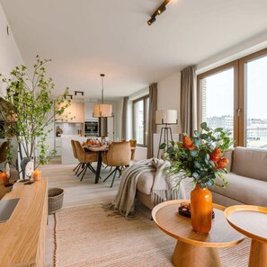 Enjoy a city view from the large window, perfect for small gatherings or meals.