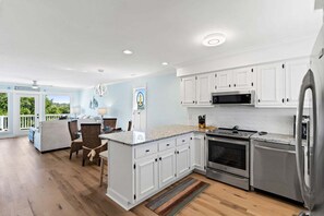 Fridge, dishwasher, coffee/tea maker, toaster - Discover Mom's Gift in Holden Beach: a 2-bed, 3-bath duplex for unforgettable family getaways. (Holden Beach)