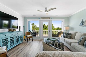 TV - Discover Mom's Gift in Holden Beach: a 2-bed, 3-bath duplex for unforgettable family getaways. (Holden Beach)