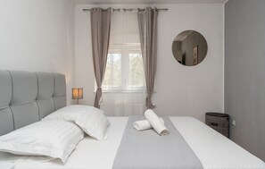 2 slaapkamers, een strijkplank/strijkijzer, gratis wifi, beddengoed
