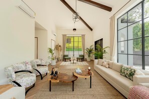 Premium Villa, 4 Bedrooms | Living area | 48-inch Smart TV with digital channels, Netflix, streaming services