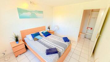 2 bedrooms, desk, iron/ironing board, travel crib