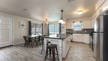 Microwave, stovetop, dishwasher, coffee/tea maker