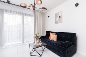 Apartamento, 1 quarto, sacada | Sala de estar