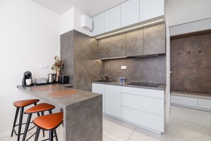 Apartamento, 1 quarto, sacada | Sala de jantar