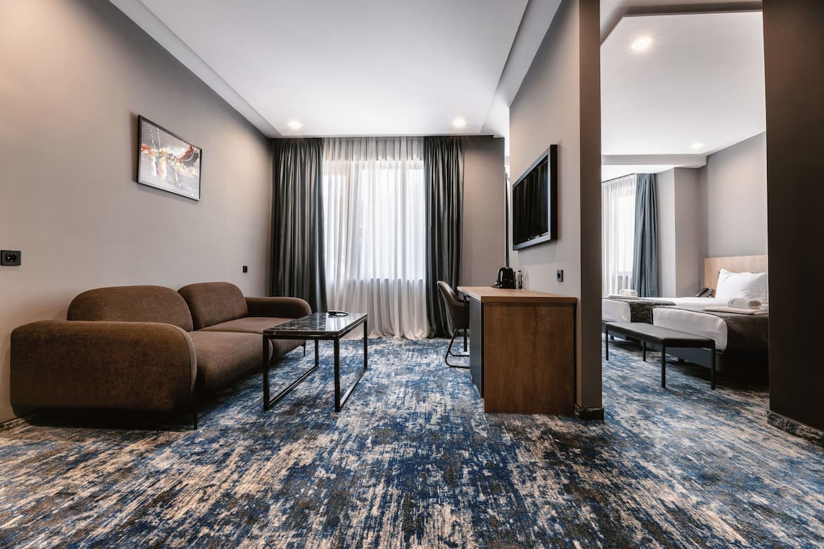 Deluxe Twin kamer | 1 slaapkamer, luxe beddengoed, Tempur Pedic-bedden, een minibar