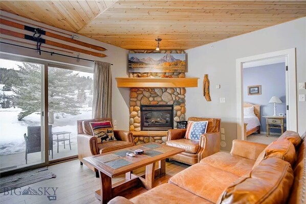 Fireplace - First Floor End Unit Condo in the heart of Big Sky! (Gallatin Gateway)