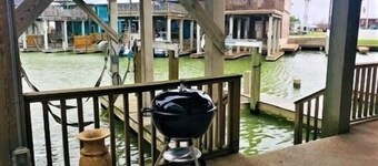 2 Boat Slips with Lifts. 2 Bedroom, 2 Bath. Large Garage.