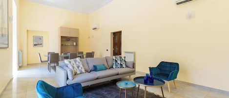 Apartment | Living area | 35-inch flat-screen TV with digital channels