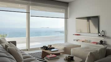 Luksus-villa - havudsigt | Opholdsområde | 65-tommers smart-tv med kabelkanaler, pejs, Netflix