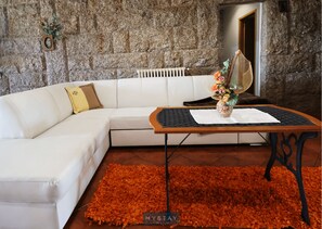 House, Patio | Living area | 20-inch flat-screen TV with cable channels