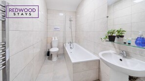 Comfort Apartment, 2 Bedrooms, Bathtub | Bathroom | Combined shower/tub, free toiletries, hair dryer, towels