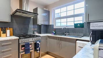 Design Apartment, 2 Bedrooms | Private kitchen | Full-size fridge, microwave, oven, stovetop
