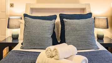 Design Apartment, 2 Bedrooms | 2 bedrooms, desk, laptop workspace, iron/ironing board