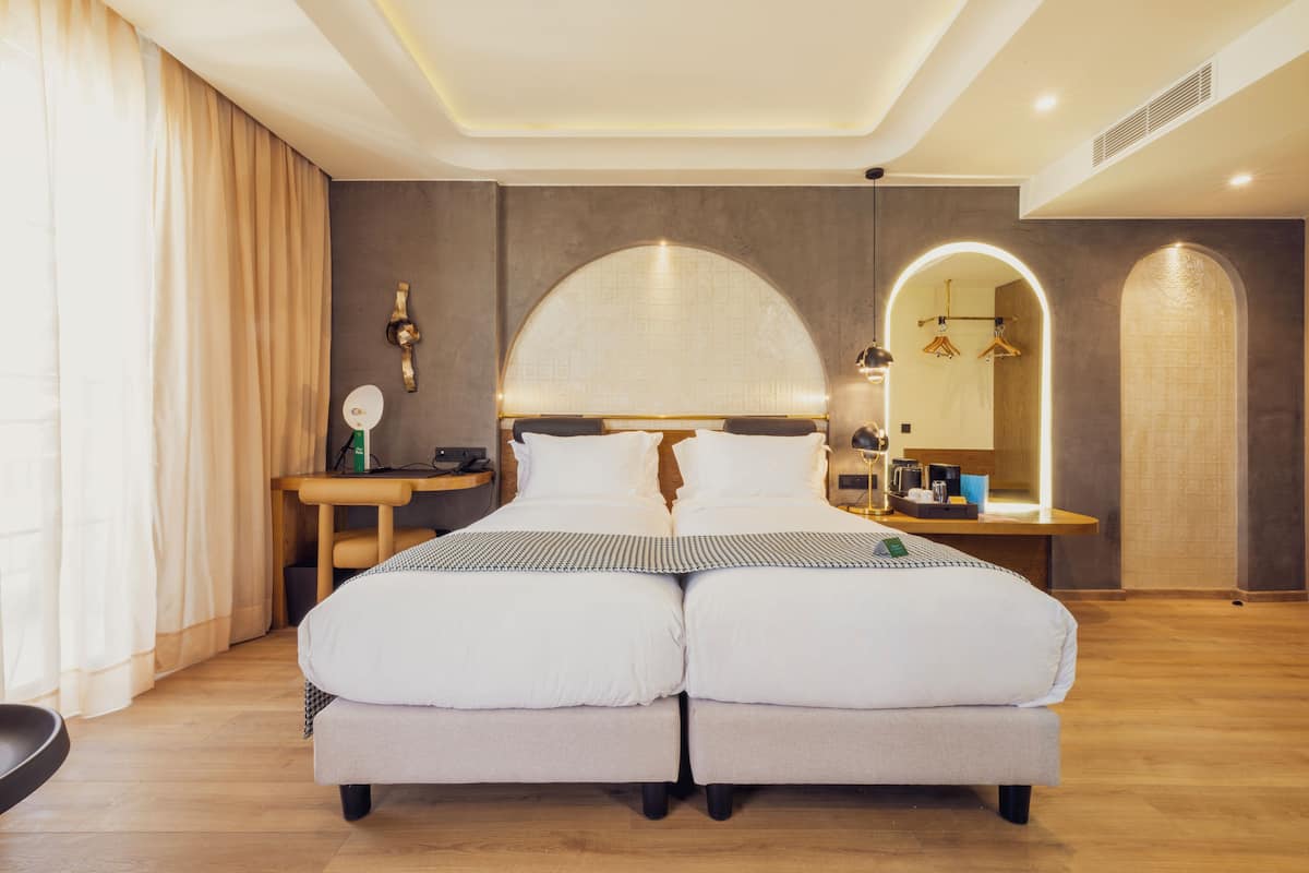 1 dormitorio, ropa de cama de alta calidad, minibar y caja fuerte